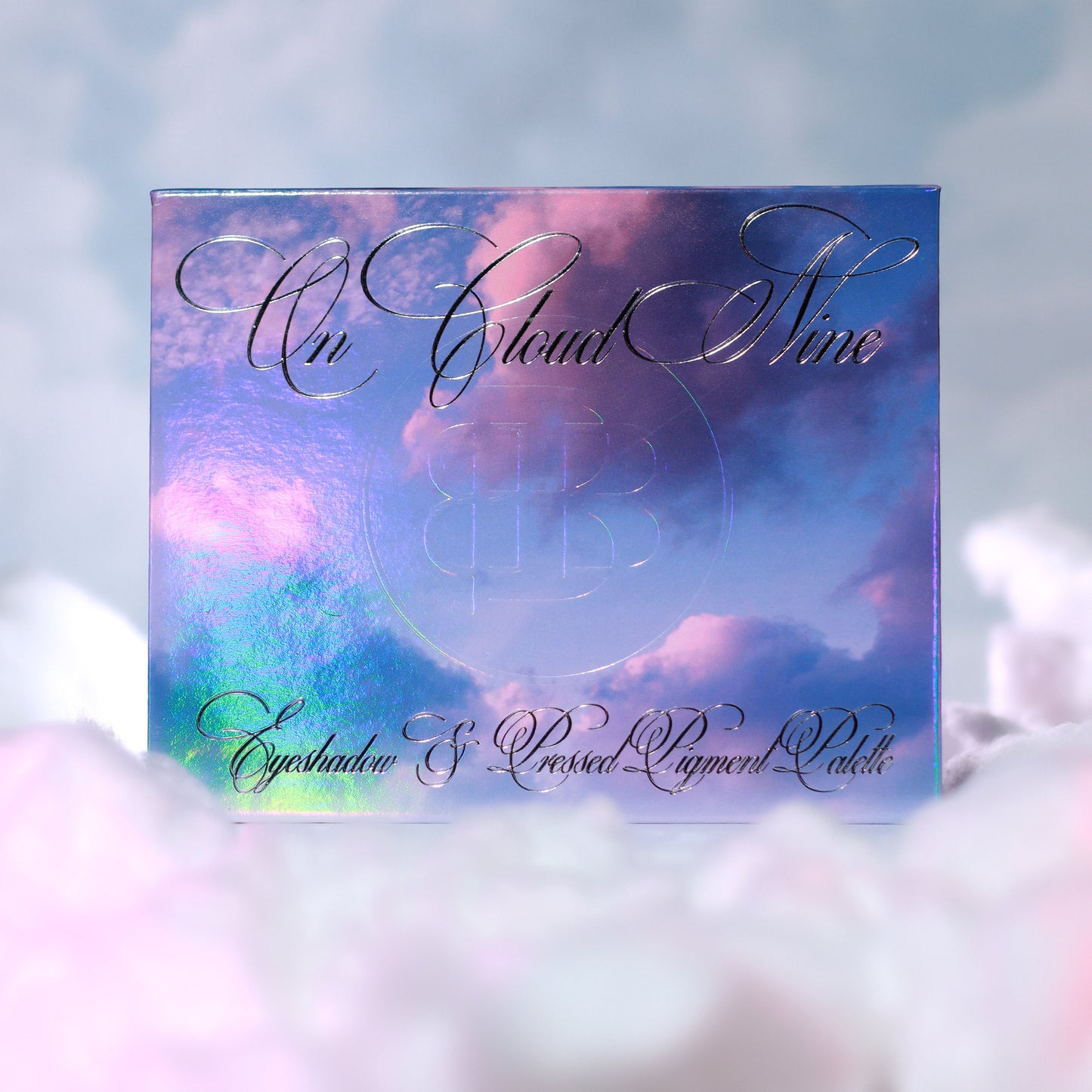 On Cloud 9 palette closed, iridescent cover reading On Cloud Nine Eyeshadow and Pressed Pigment Palette