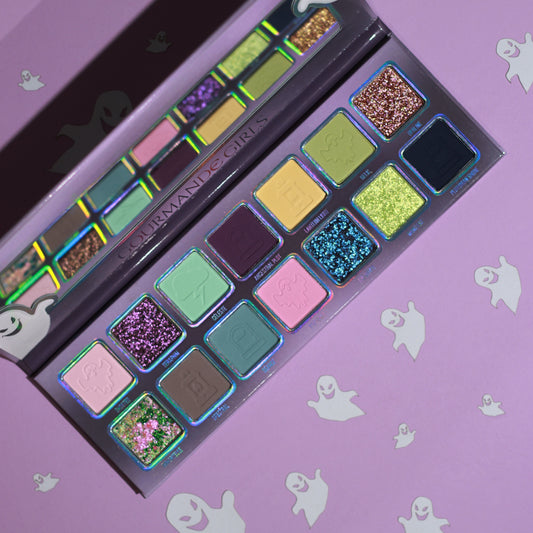 Gourmande Girls Apparition eyeshadow palette open, pastel-goth colour story with ghostly greens, faded lilacs, spectral blues, and muted pinks