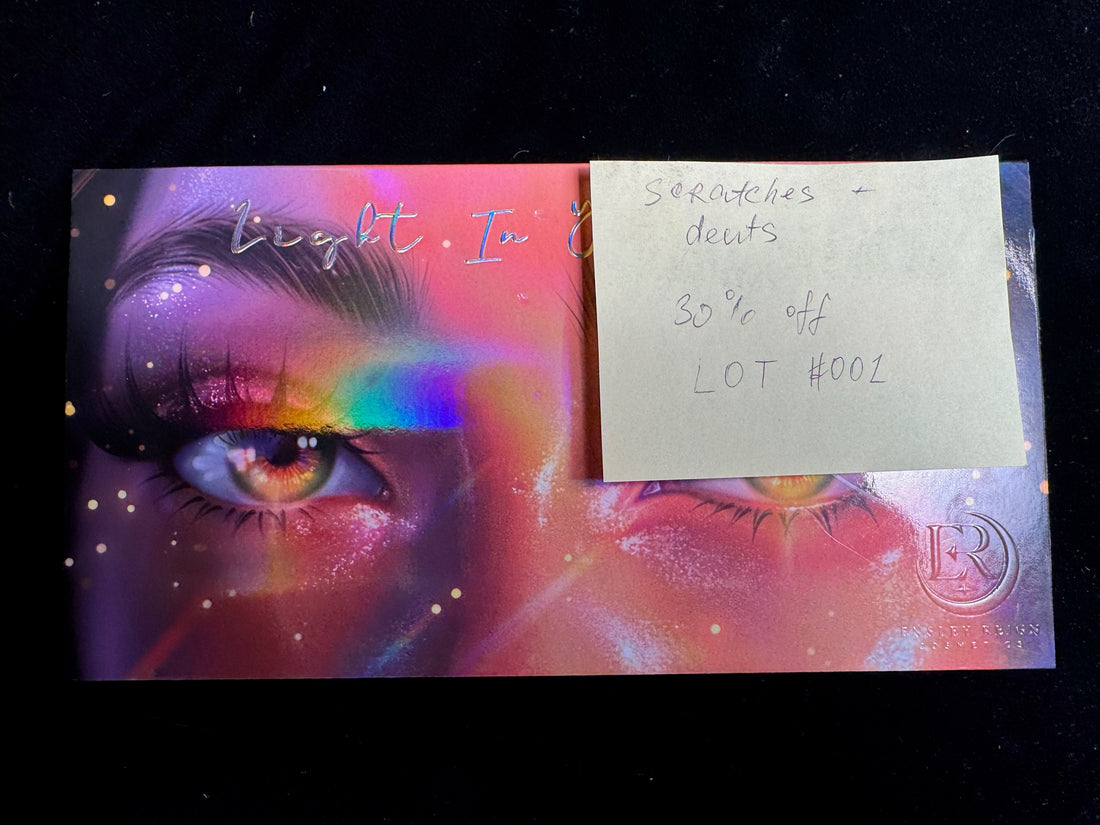 LOT #001 - Light in Your Eyes eyeshadow palette (Ensley Reign). Damaged sleeve and cover.