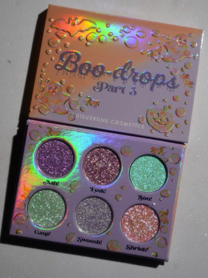 The palette open in daylight, the holographic Boo-drops Part 3 lid above the six labelled pans.