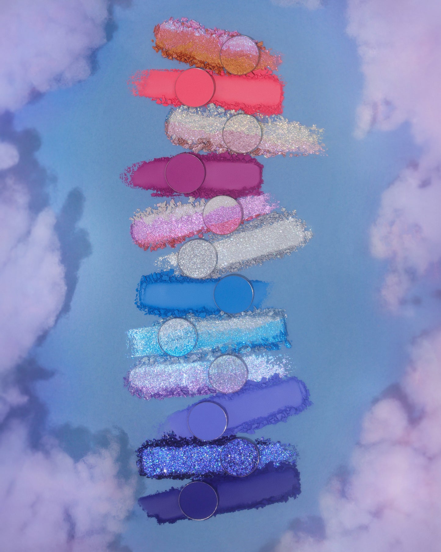 On Cloud 9 shades as swatch smears on a cloud background, coral, pink, silver, and blues