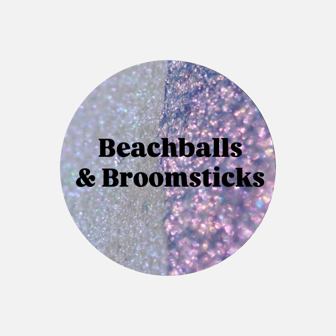 Beachballs and Broomsticks pan macro, the split between a pale periwinkle glow and a purple and pink sparkle.