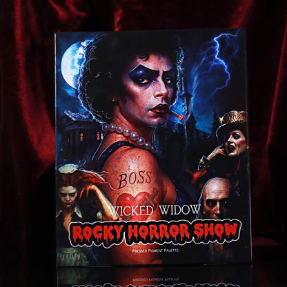 Wicked Widow Beauty Rocky Horror Show pressed pigment palette box front featuring Frank-N-Furter artwork against red velvet