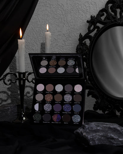 BellaBeauteBar Yin & Yang x Freya86_ff eyeshadow palette open in a dark gothic setting with candelabra and ornate mirror