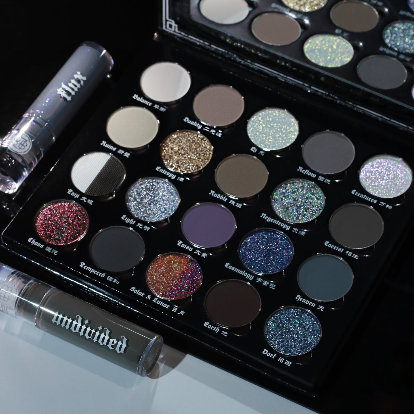 BellaBeauteBar Yin & Yang x Freya86_ff palette open showing all 20 shades with Flux and Undivided liquid eyeshadow tubes alongside