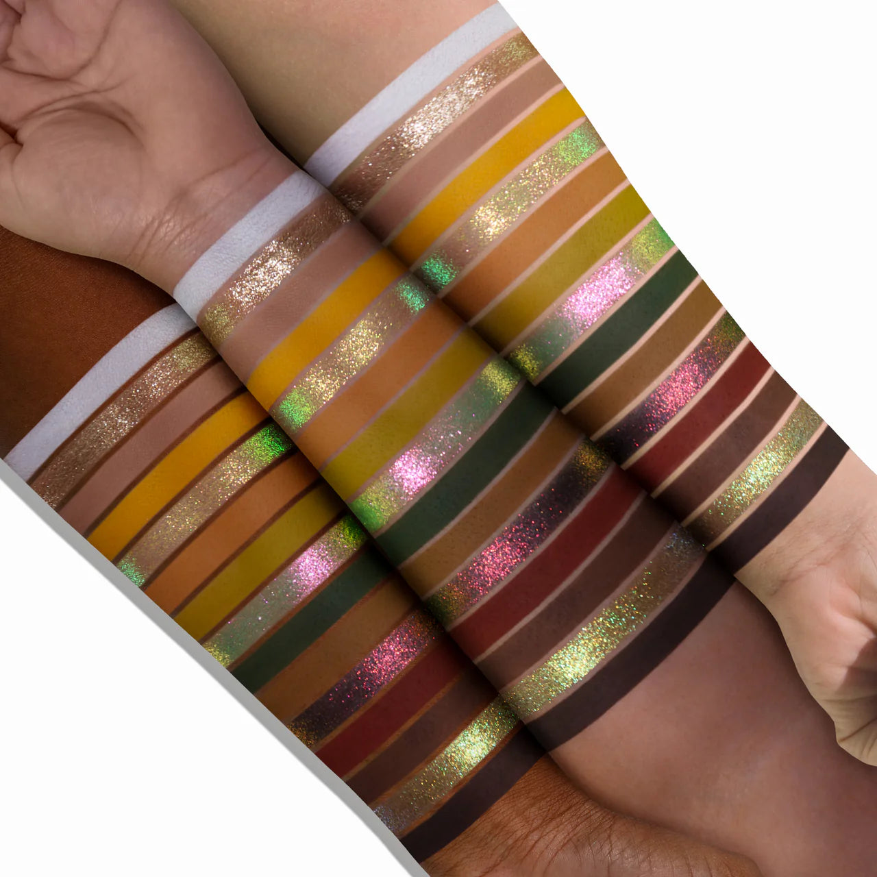 All 15 shades swatched on two skin tones, light and deep, showing green and pink colour-shifting multichromes, gold metallic, yellows, oranges, and brown mattes