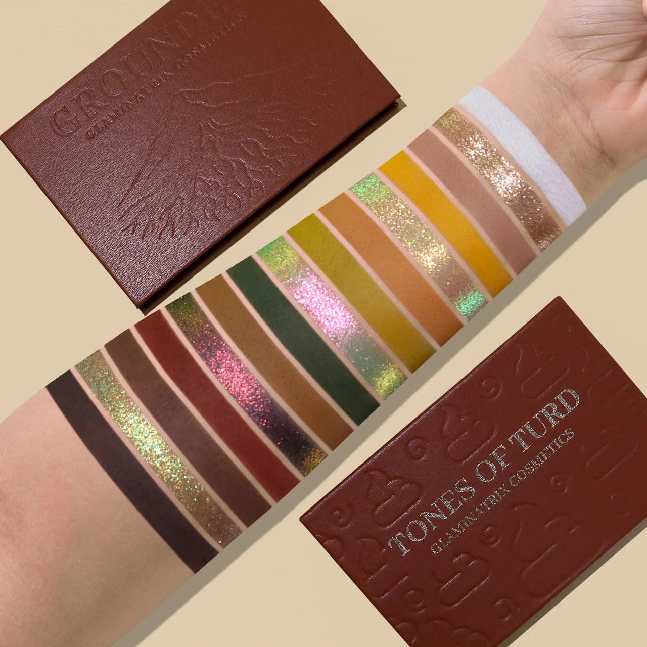 Full shade range swatched on a light skin tone beside the closed Tones of Turd and Grounded palettes, green-pink multichromes, gold metallic, and warm mattes