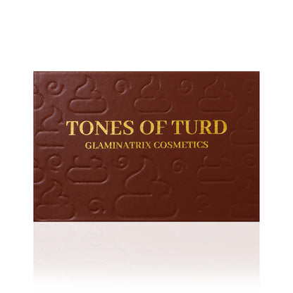 Tones of Turd palette closed, brown box with gold lettering and an embossed pattern of cartoon poop swirls