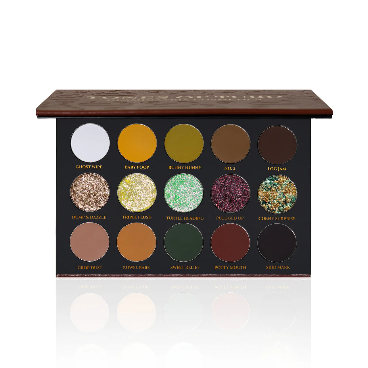 Tones of Turd palette open top-down, 15 labelled pans across three rows of mattes, multichromes, and a metallic shimmer in yellows, greens, and browns