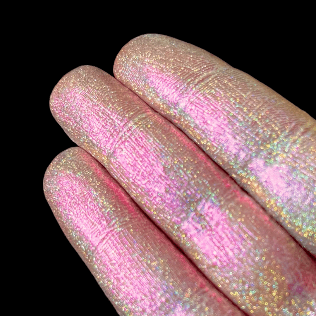 Holo Petal swatch: soft pink base with full rainbow holographic flash