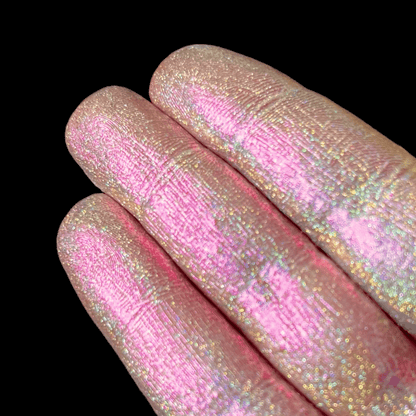 Holo Petal swatch: soft pink base with full rainbow holographic flash