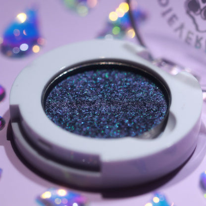 Fireflies and Phantoms in its open magnetic compact on a lilac backdrop