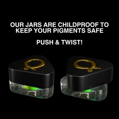 Two triangular Question Beauty jars with black push and twist childproof lids and the gold Q logo, shown closed and tilted on a black background.