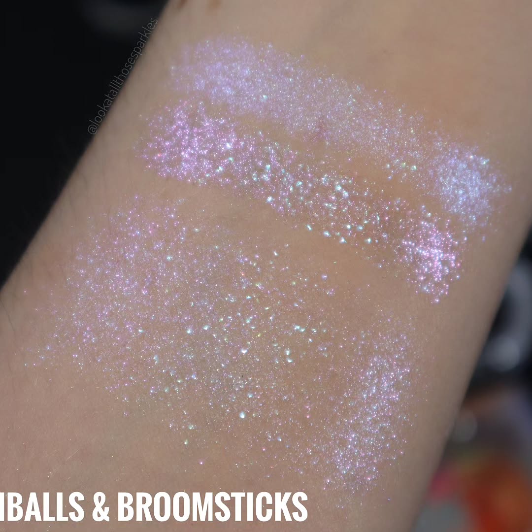 Beachballs and Broomsticks swatched twice on light skin, pressed and blended, with a creator watermark.