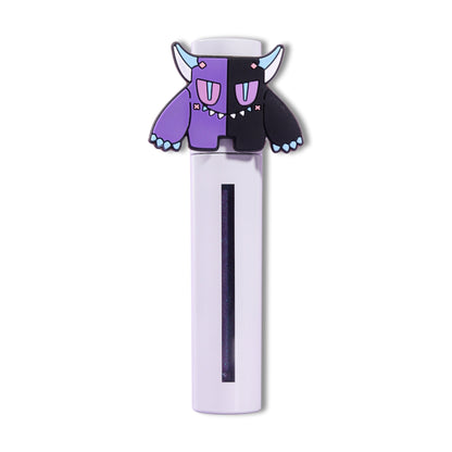 Pinch lip mud tube capped with the purple Gloom mascot topper, dark product visible through the window.