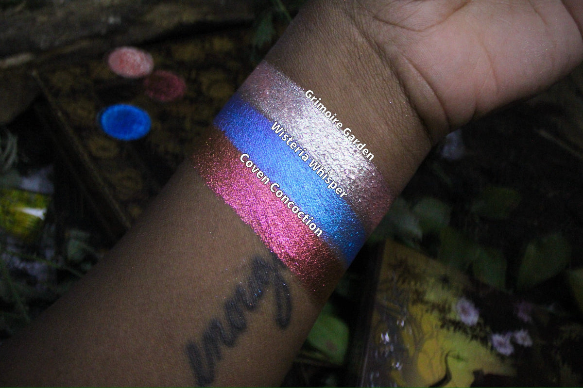 Labelled swatches of all three singles on deep skin.