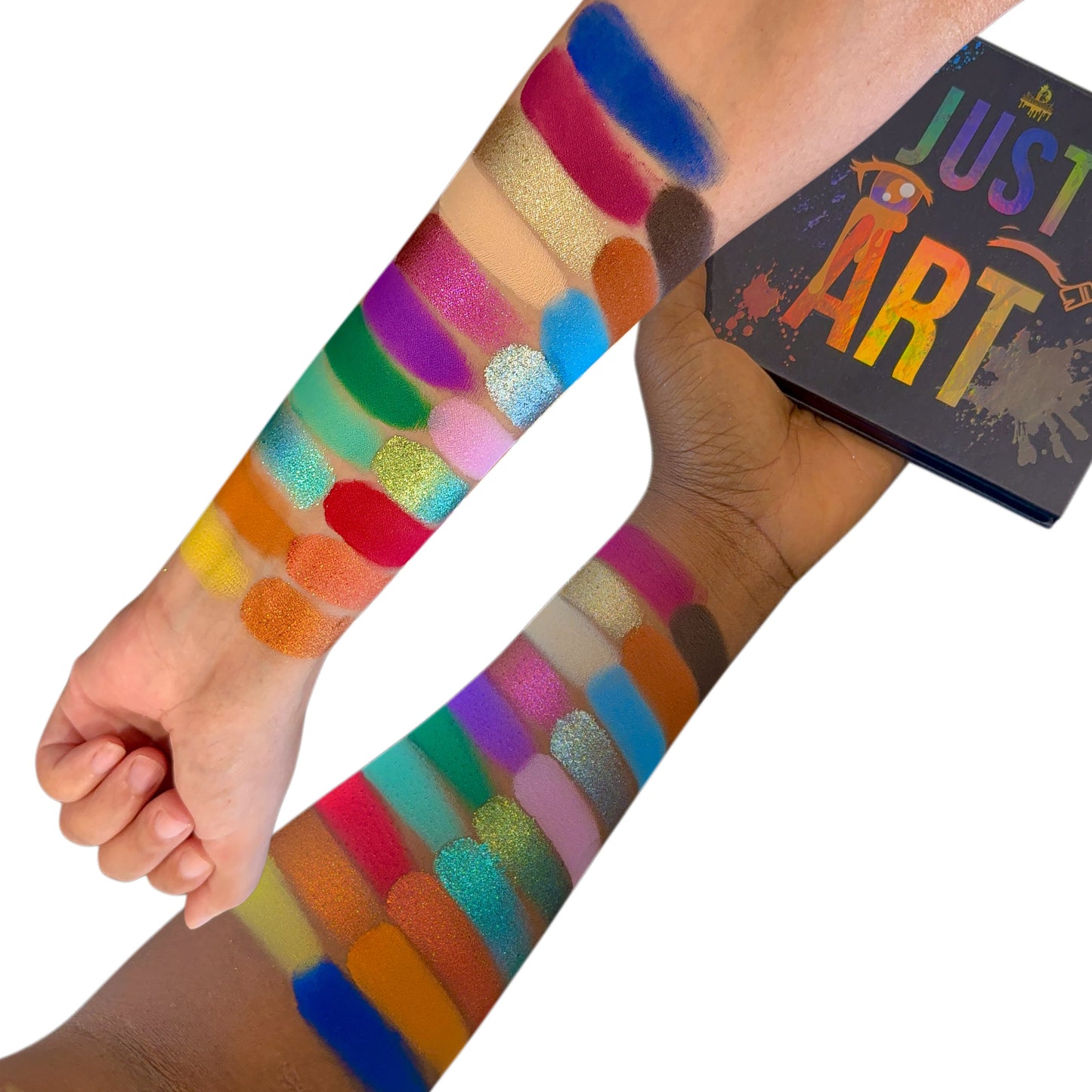 Arm swatches of the Just Art shades on two skin tones, with the Just Art box, white background