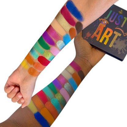 Arm swatches of the Just Art shades on two skin tones, with the Just Art box, white background