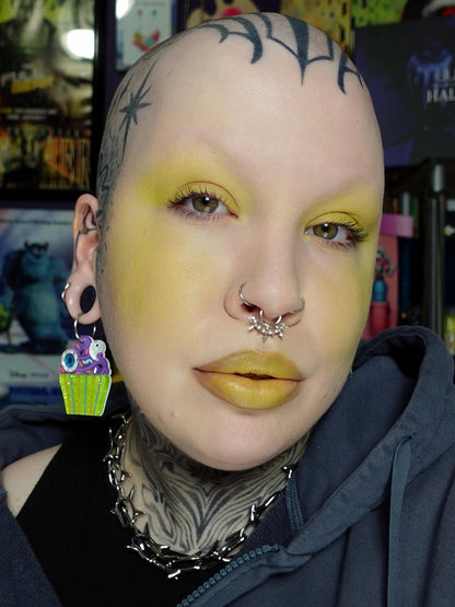 Eerie, the electric chartreuse, worn on the lids and lips.