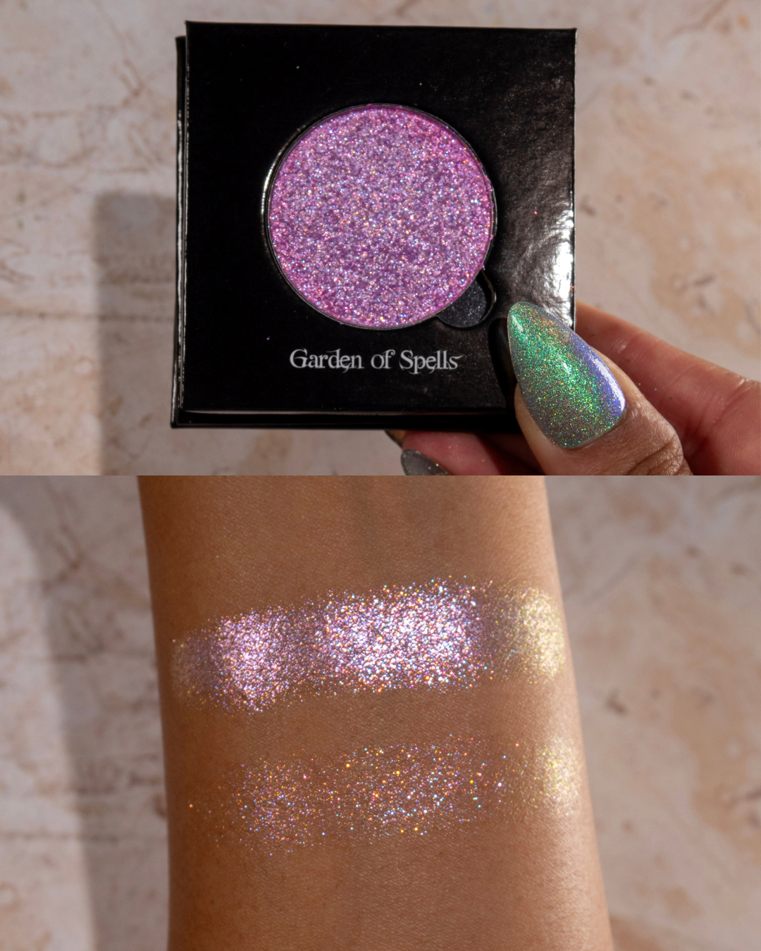 Open compact held in hand above two swatches on medium skin.