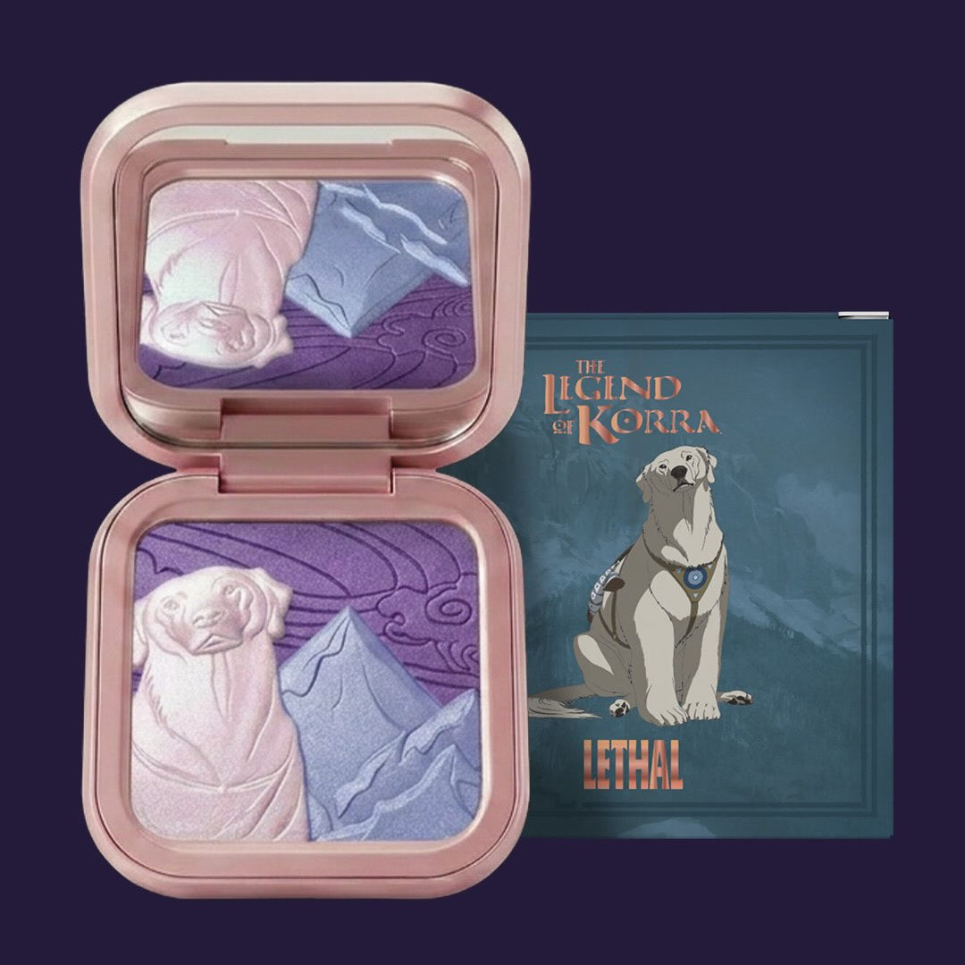 Lethal Naga blushlighter open beside its box on a dark navy backdrop, pan embossed with a pale Naga figure and blue mountain against a purple sky