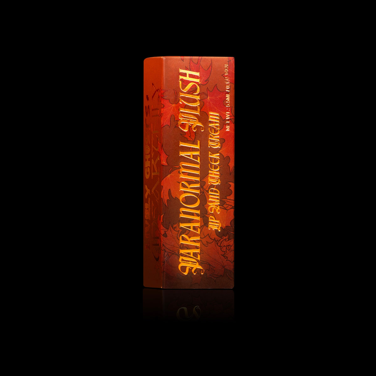 Paranormal Plush lip and cheek cream box, burnt orange with a maple leaf print and gold lettering, Lively Ghosts x Unearthly on the side