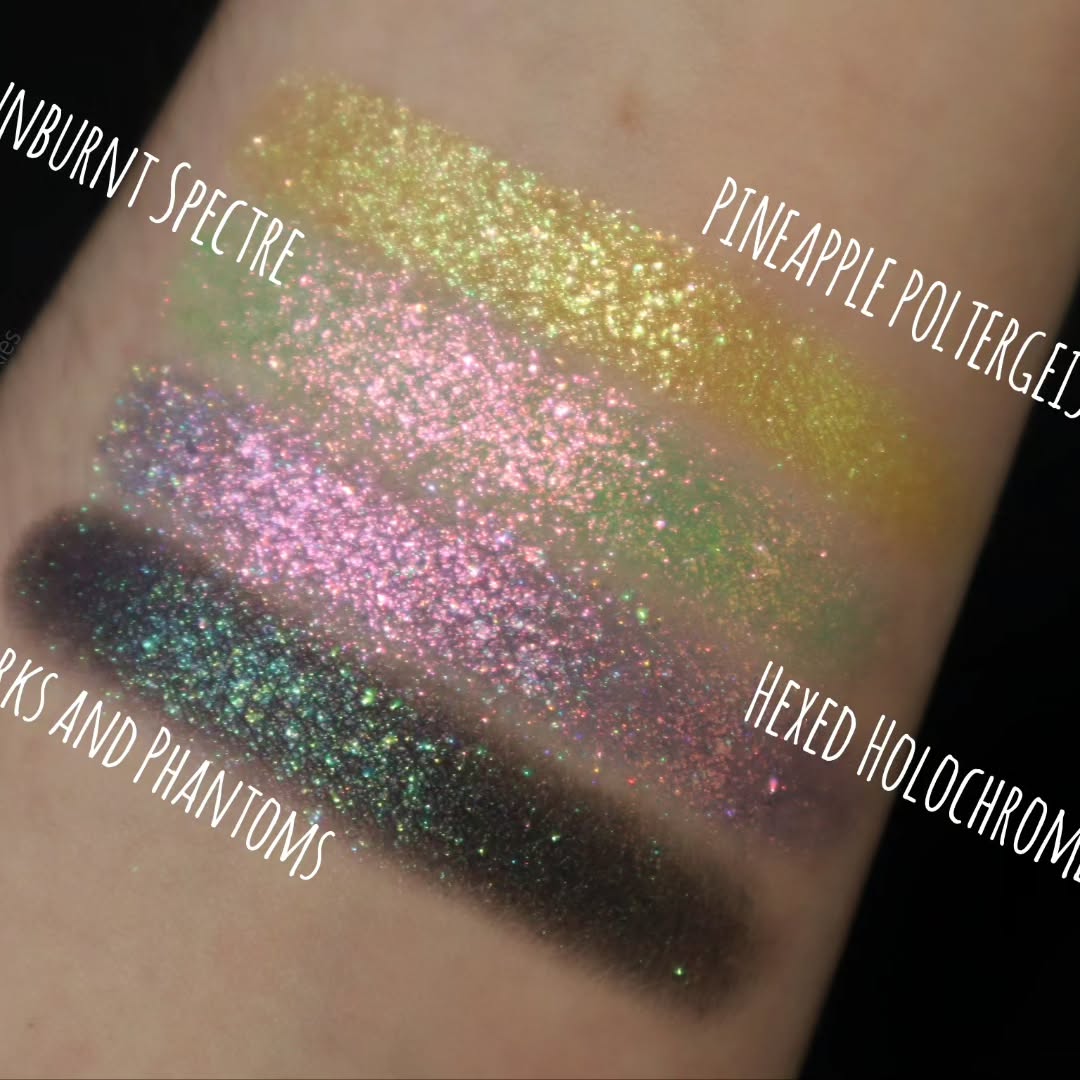 All four Summerween singles swatched on light skin and labelled