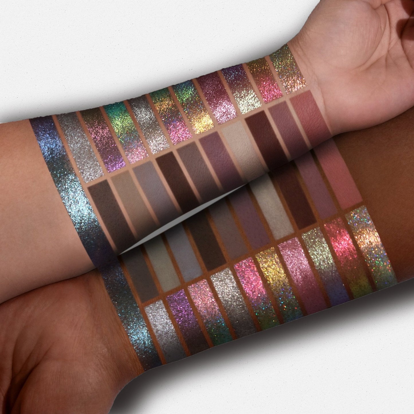 Cold Moon palette - all 21 shades swatched on medium and dark skin tones, studio shot on grey background