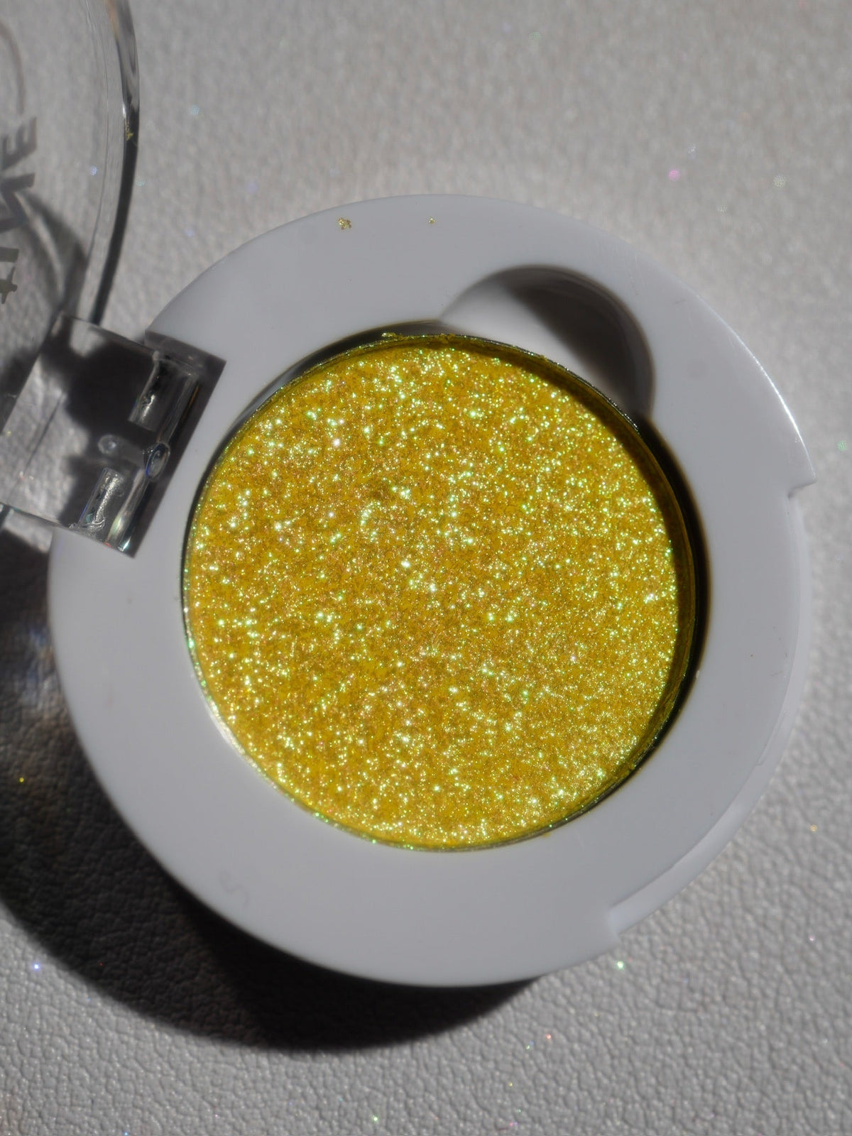 Pineapple Poltergeist open compact from above