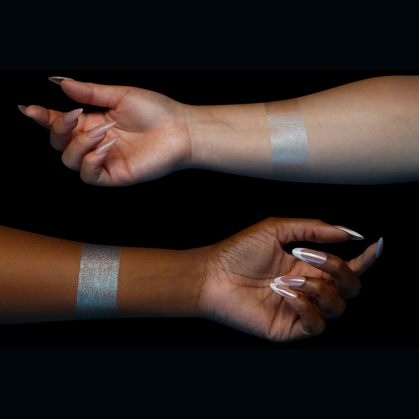 Dewlight silver-blue glow swatched on two skin tones
