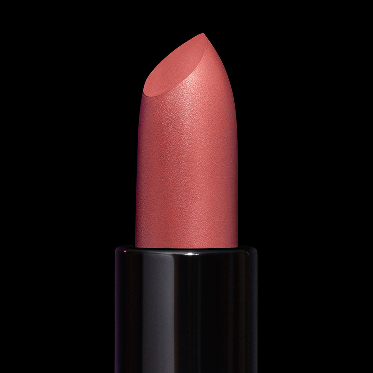 Close-up of the Bewitched bullet, mauvy pink with a slanted tip