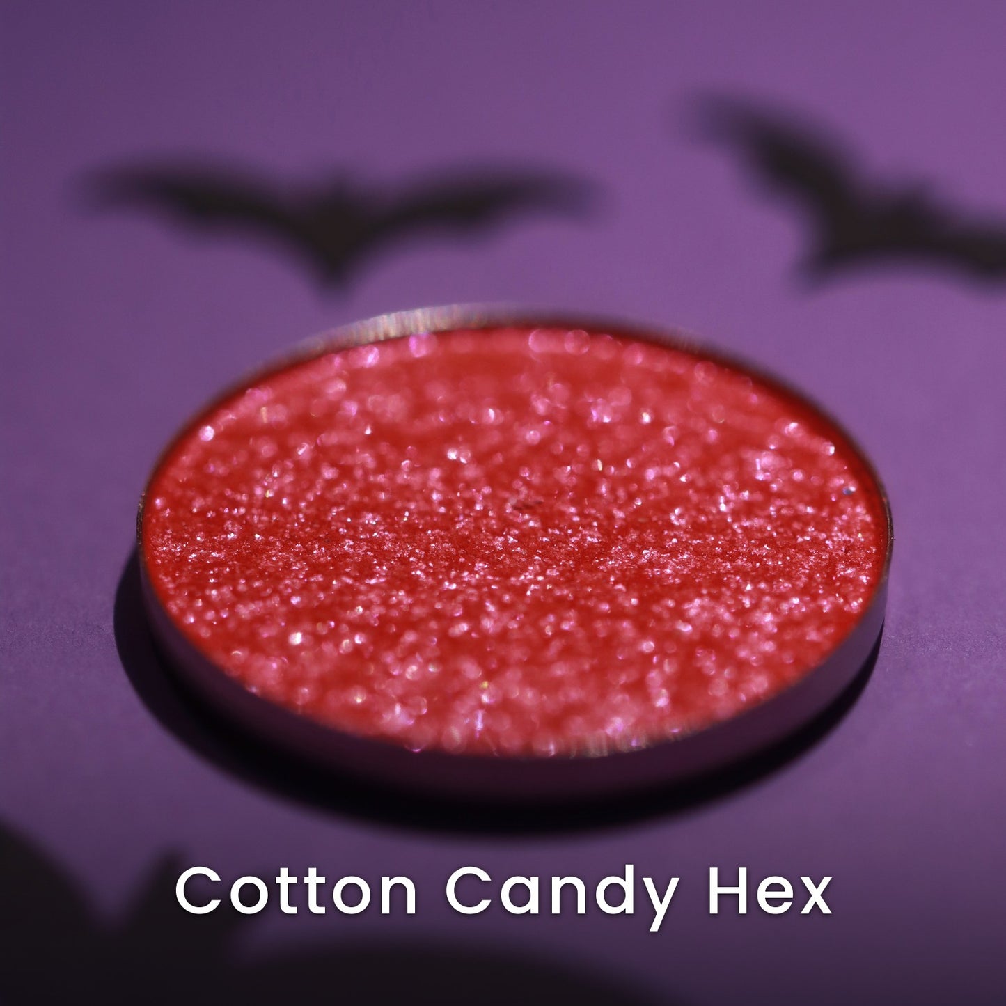 Cotton Candy Hex pressed pigment pan, high-shine coral to pink duochrome