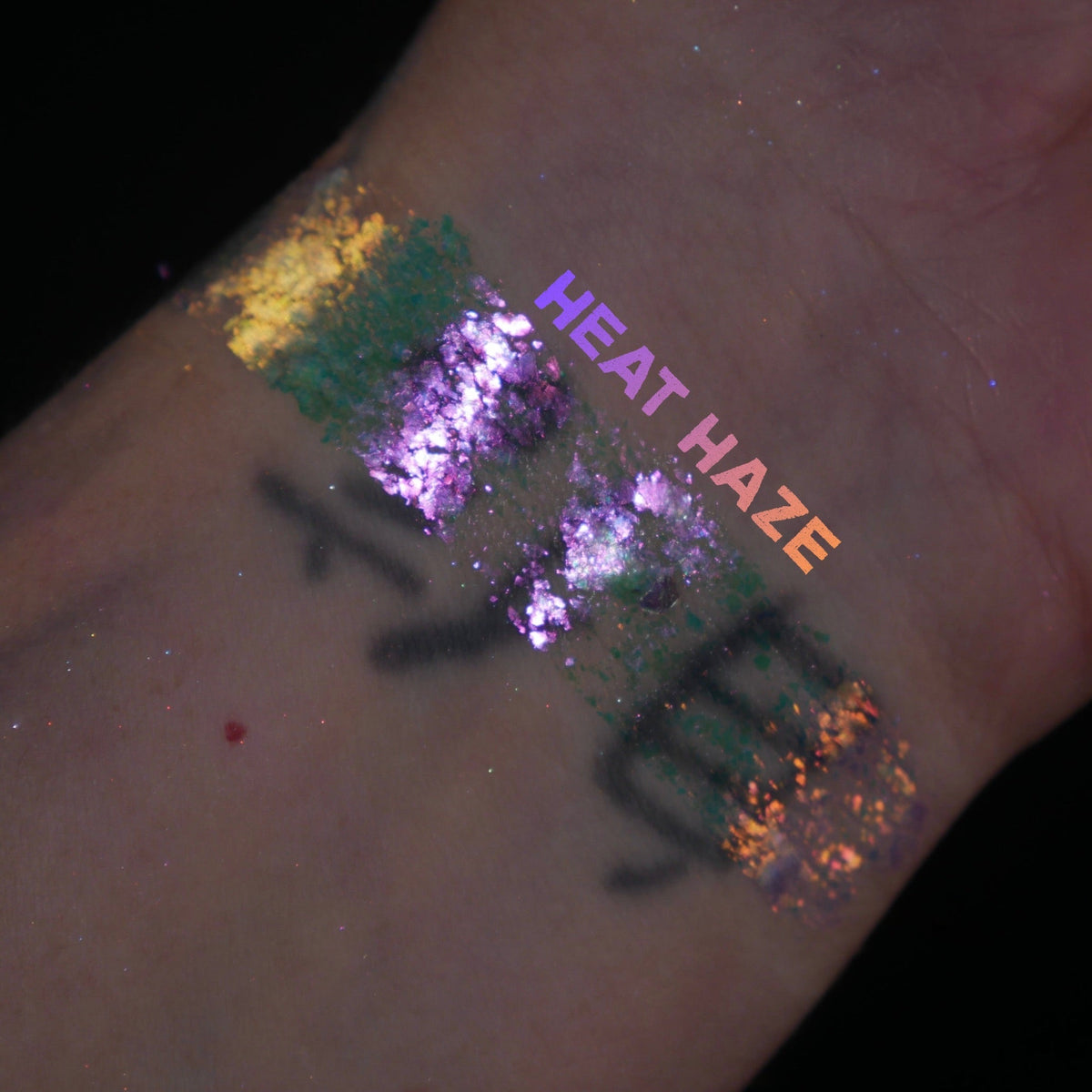 Heat Haze arm swatch on light skin, labelled