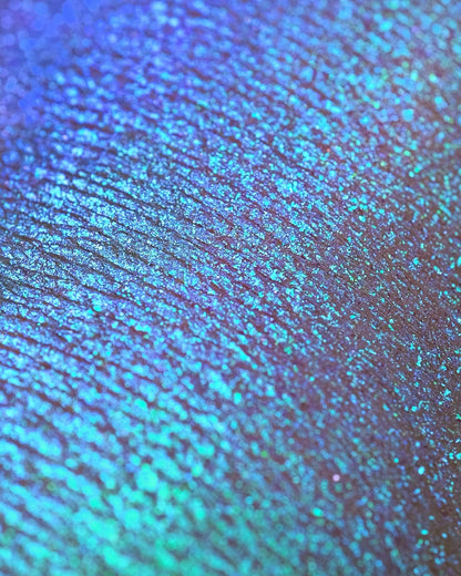 Dreamer swatch: iridescent sky blue shifting through aqua and turquoise to seafoam and mint
