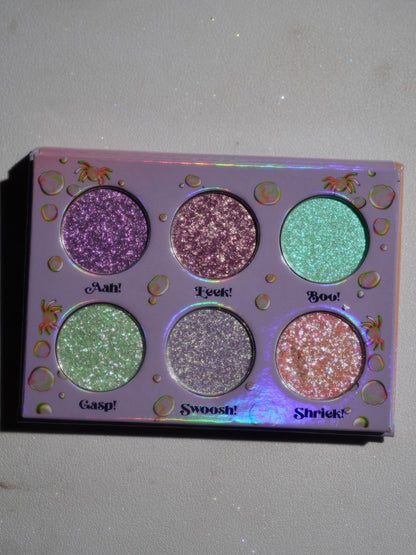 The open palette flat on a pale background, all six pans labelled Aah!, Eeek!, Boo!, Gasp!, Swoosh! and Shriek!.