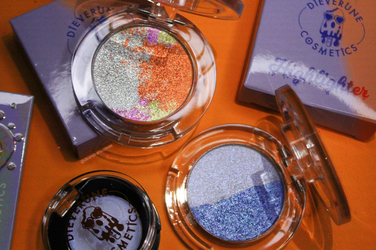 Both Summerween highlighter compacts open on orange with the brand's boxes behind them.