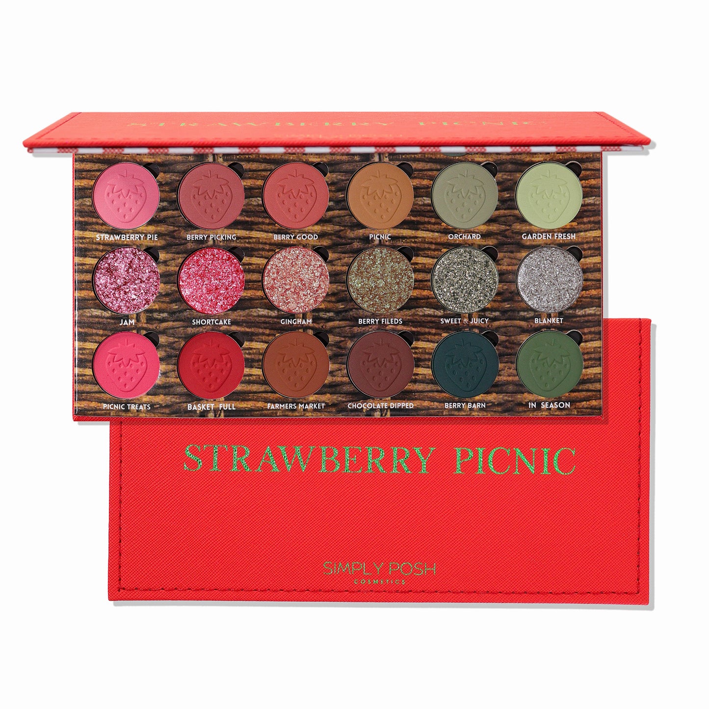 Simply Posh Strawberry Picnic eyeshadow palette open with its red faux-leather cover, 18 pans in pink, red, brown, and green over a wood-grain tray