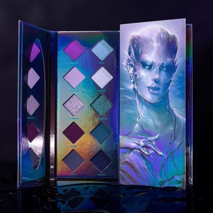 Last Breath mini palette open, ten diamond pans of purples, pale blues, teals and navy on holographic card, siren art on the lid.