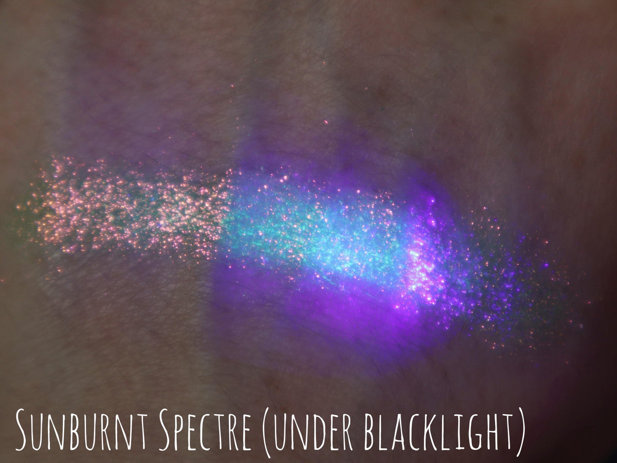 Sunburnt Spectre arm swatch under blacklight