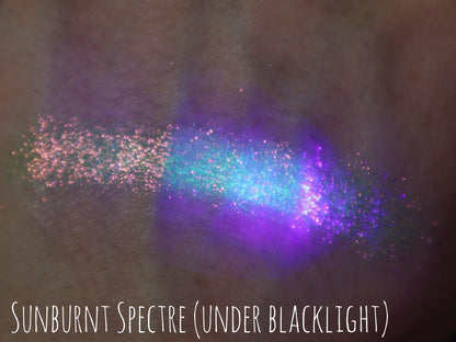 Sunburnt Spectre arm swatch under blacklight