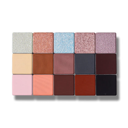 Close-up of the 15 Flora pans: metallic shimmers over warm neutrals, pinks, plum, rust, and black