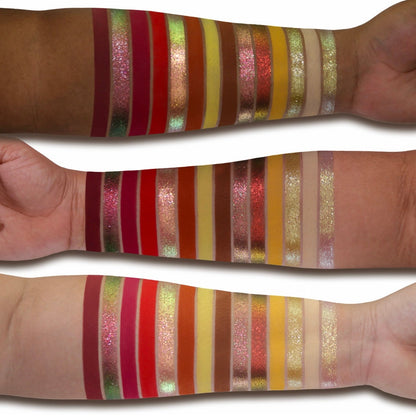 Pandemonium swatches on three skin tones, the full range swiped side by side: burgundy, pink and green sparkles, reds, rusts, yellows and gold