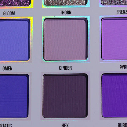 Close-up of the Gleam x Gloom pans showing the shade names Gloom, Thorn, Omen, Cinder and Hex.