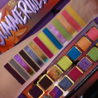 Summerween palette beside an arm swatched with the full range, neon greens and blues, candy pinks, and gold and purple sparkles