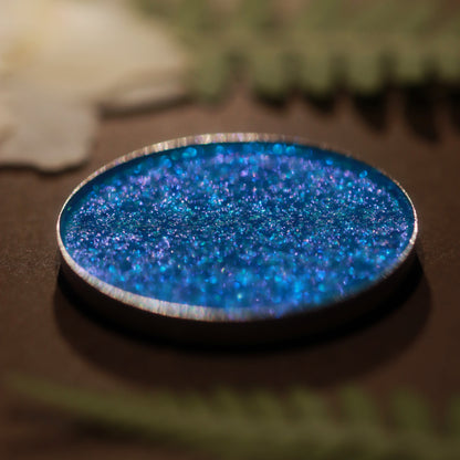 Wisteria Whisper pan close-up: blue with violet sparkle.