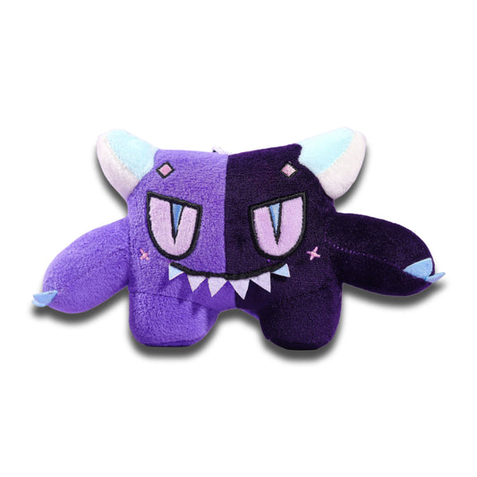 Gloom plush keychain from the front, a two-tone purple critter with pale blue horns, a fanged grin and short wings.