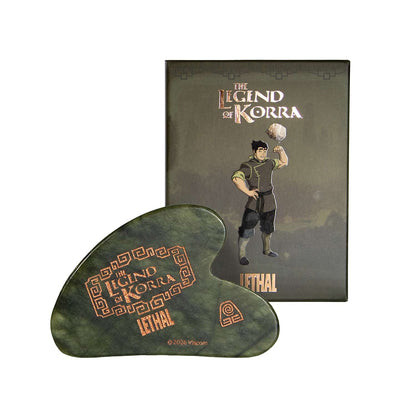 Lethal Bolin grounding gua sha from the Legend of Korra collection, green jade tool in front of its Bolin box
