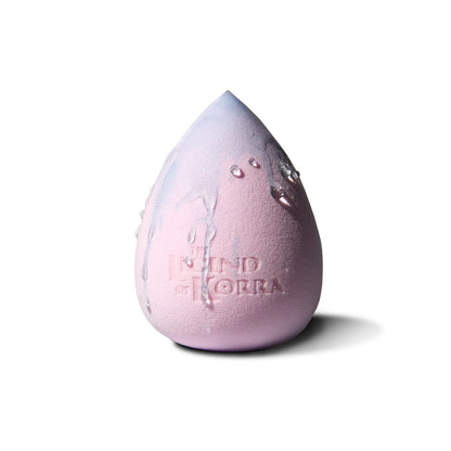 The Spirit World sponge in its warm pink state with water droplets