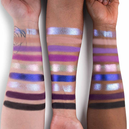 Vaatu palette swatched on three skin tones: purples, periwinkles, teal, plum, and a deep matte across nine shades