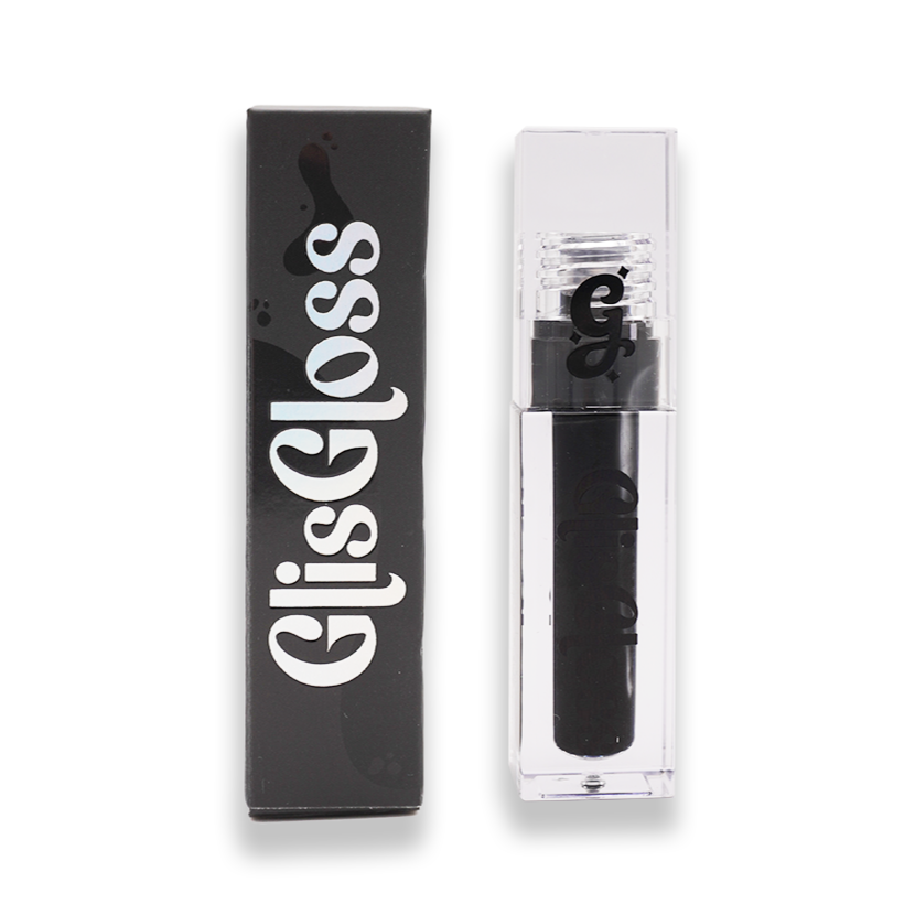 Liquorice Glis Gloss by Glisten Cosmetics: opaque black lip gloss in a clear tube with a black outer box marked with ink-splatter motif